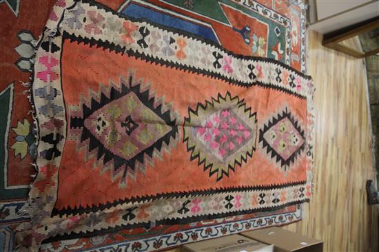 A collection of Aubusson cushions and Kilim rug